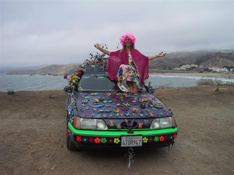 Illustration for article titled Groovalicious Purple Princess Of Peace Art Car Falls On Hard Times, Faces Crusher
